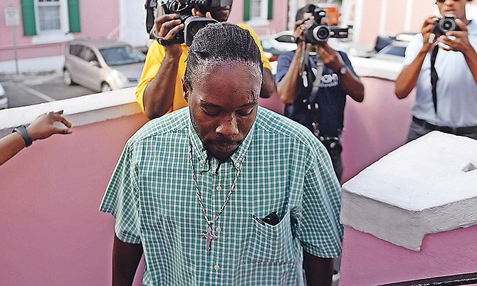 Jean Rony Jean-Charles on his way to appear before Supreme Court Justice Gregory Hilton.

Photo: Shawn Hanna/Tribune Staff