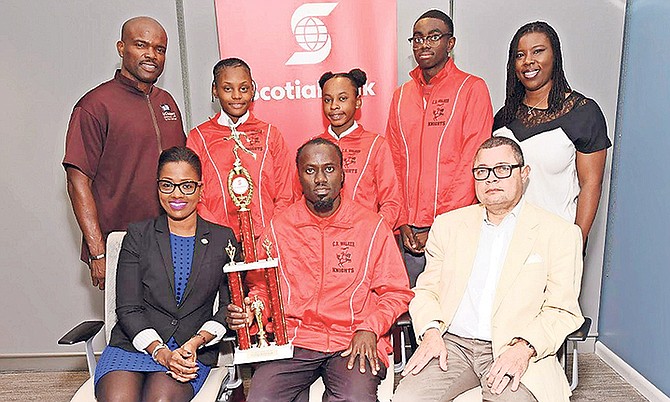 1st place Mixed Relay C.R. Walker Senior High School Seated (l to r) Nakera Symonette, Senior Manager, Marketing & Public Relations, Scotiabank Caribbean North; Ednal Rolle, Head Coach, C.R. Walker Secondary School; and Paul J.I. McWeeney, President, Sunshine Insurance (Agents & Brokers) Ltd. Standing Trevor H. Strachan, Race Coordinator, Students Run; and Maxine V. Seymour, Manager, Public & Corporate Affairs, Sponsorships & Philanthropy, Scotiabank with mixed relay team members Clemeka Gibson, Tamia Mackey and Lhevinne Joseph. Missing from photo Fedline Louis, Runner
