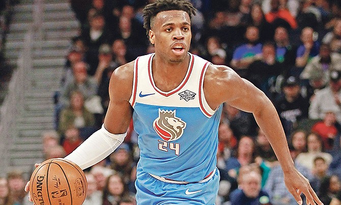 Sacramento Kings guard Buddy Hield (24) drives on Minnesota Timberwolves in the third quarter of an NBA basketball game Sunday, Feb. 11, 2018 in Minneapolis. (AP Photo/Andy Clayton-King)

 