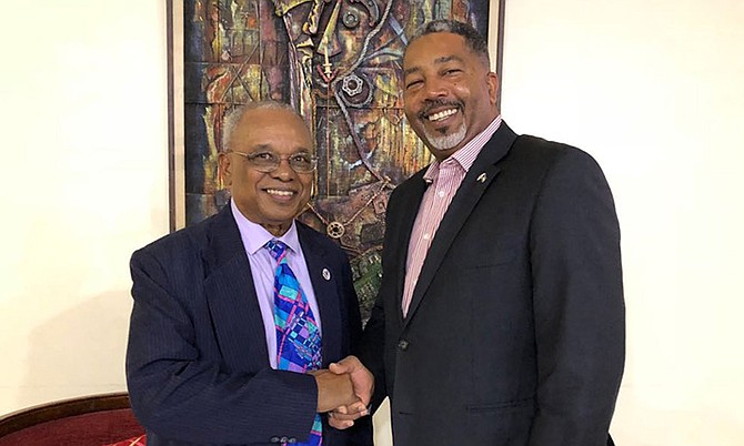 Minister of Transport & Local Government Frankie Campbell (right) is pictured being greeted by Bahamas Ambassador to the Republic of Haiti Jeffrey Williams. (Photo/Yontalay Bowe, OPM Media Services)