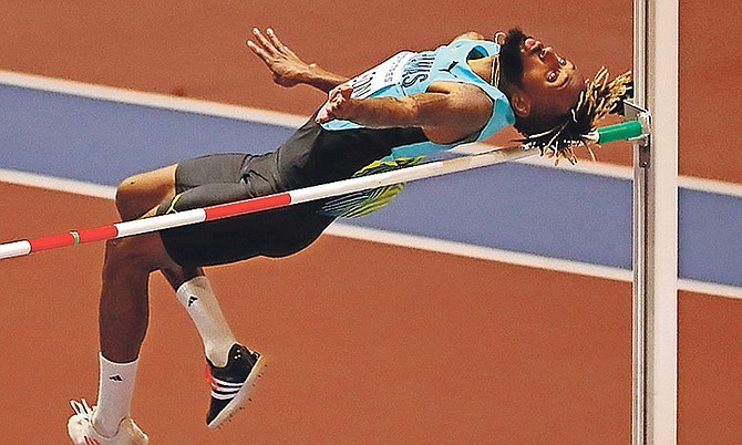 Jamal Wilson, of the Bahamas, fails during an attempt in the high jump final at the World Athletics Indoor Championships in Birmingham, Britain, yesterday. (AP)
