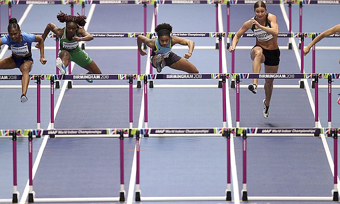 Devynne Charlton (centre) in the women’s 60 metres hurdles final. (AP)