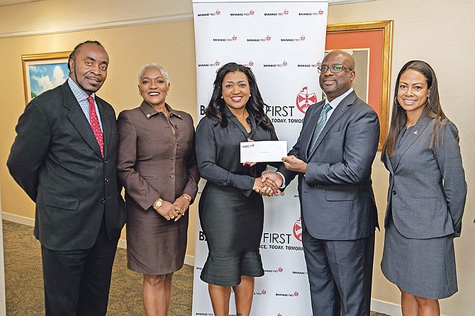 SHOWN (l-r) are Kenneth Wilson, CARIFTA sales representative, Eldece Clarke, CARIFTA sales representative, Tonique Williams, deputy chairperson CARIFTA LOC, Patrick Ward, Group President & CEO, Bahamas First General Insurance Company and Leah R Davis, group marketing and communications manager, Bahamas First Corporate Services.
Photo: Ronnie Archer