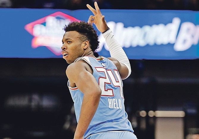 Sacramento Kings guard Buddy Hield flashes three fingers after scoring a three-point basket during the second half against the Miami Heat. Last night against the Detroit Pistons, he scored 20 points, including three three pointers, grabbed six rebounds, dished out four assists and had two steals in 33 minutes on the floor. However, the Pistons won 106-90.