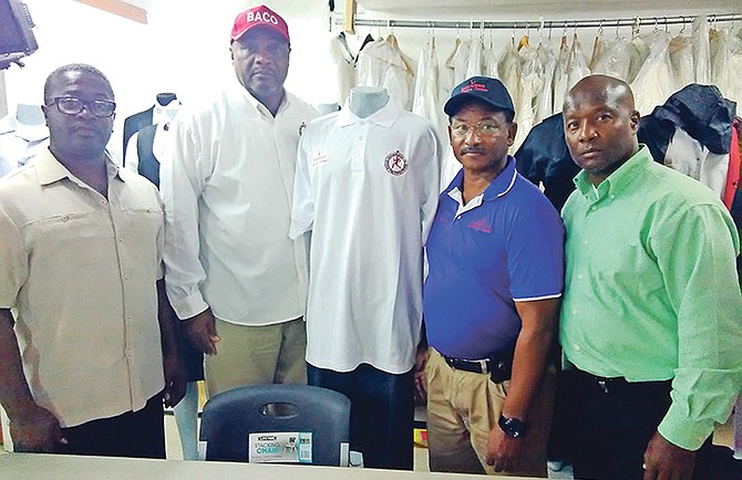 Brett Archer, Ray Hepburn, James Wallace and Barry Saunders display the new BACO uniform top for the Carifta Games.