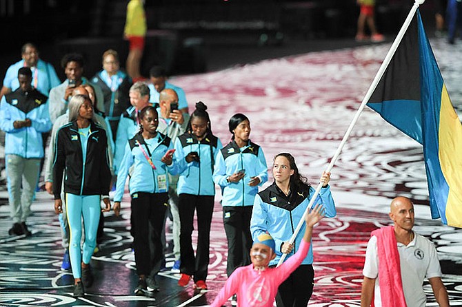 Swimmer Joanna Evans leading the Bahamas delegation into the Cararra Stadium during the official opening ceremonies of the XXI Commonwealth Games in the Gold Coast, Australia.