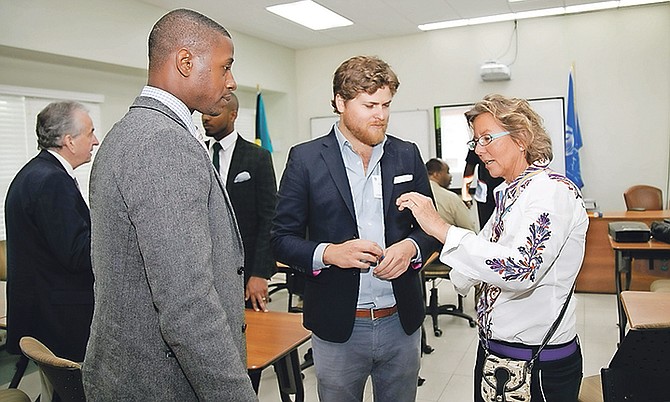 GBPA vice chairman Sarah St George discussed the Coral Vita Farm project with Gator Hepburn of Coral Vita and UOB guest at the University of The Bahamas’ Sustainable Grand Bahama event last week.