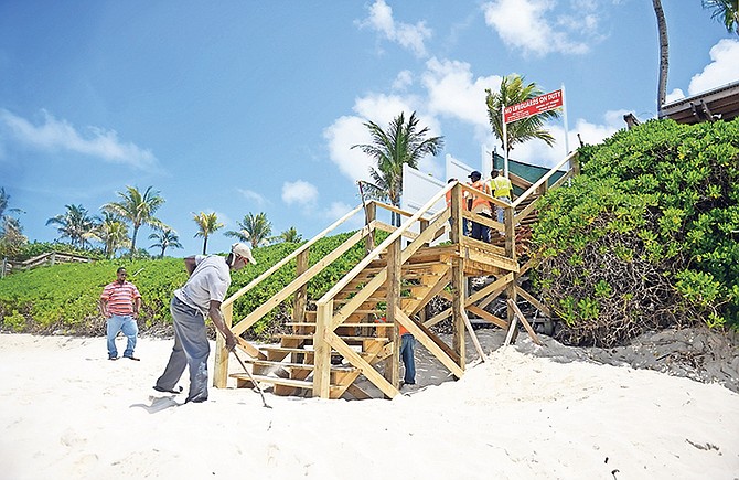 The staircase at Cabbage Beach being repaired. Photo: Shawn Hanna/Tribune Staff

