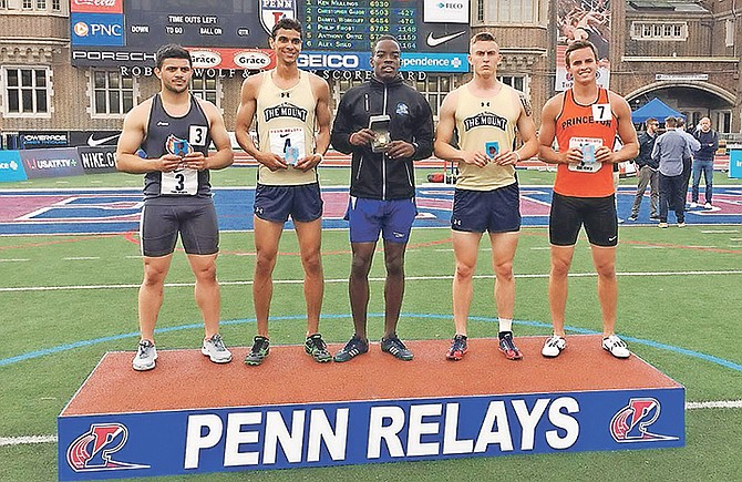 Ken Mullings on the medal podium yesterday after he took the gold in the college men's decathlon at the Penn Relays.