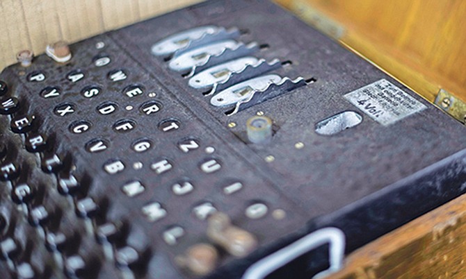 AN Enigma machine sits inside a display case at Carnegie Mellon University’s Hunt Library in Oakland, Pa. Photo: Nate Smallwood/AP
