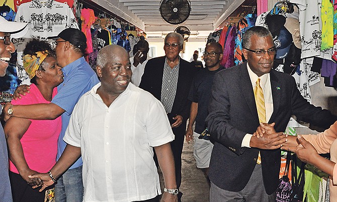 Leader of the Opposition Philip 'Brave' Davis tours Port Lucaya Market Place with PLP Chairman Fred Mitchell. Photo: Vandyke Hepburn