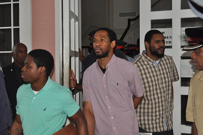Devaughn Hall, Kevin Dames and Paul Belizaire outside court.