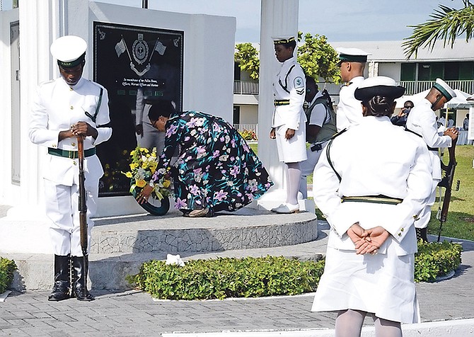 Prime Minister Dr Hubert Minnis leaves a wreath to mark the anniversary of the deaths of four marines when the HMBS Flamingo was attacked in 1980.