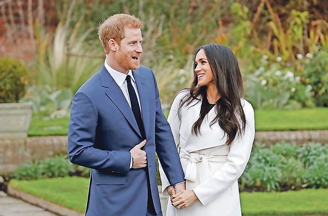 Britain’s Prince Harry and his fiancée, Meghan Markle. (AP Photo/Matt Dunham)
