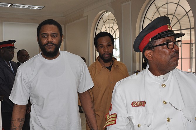 Paul Belizaire (left) appears in Supreme Court for his sentencing hearing. Kevin Dames (centre) also appeared for a bail hearing. Photo Vandyke Hepburn