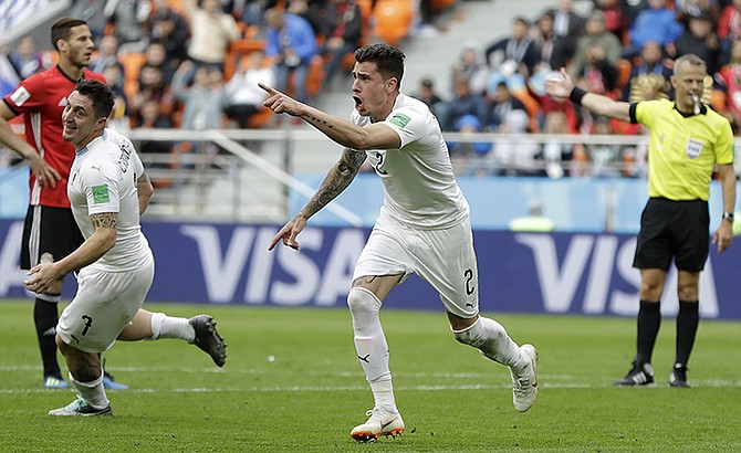 
Uruguay's Jose Gimenez celebrates after scoring his side's opening goal. (AP)
