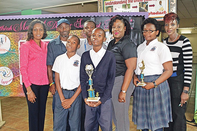 SC McPherson recently hosted its seventh annual mathematics competition among junior high schools. From left, SC McPherson math teacher Cecilily Flowers, CWCO operations manager Jeffrey Burrows, Torian Carey, Larry Miller, Asaph Ruinolds, CWCO accounts manager Welliya Cargill, Kourtney Armbrister, and SC McPherson math teacher and teacher of the year Tiffany Daxon.

Photo: Serena Williams Media and PR

 

 