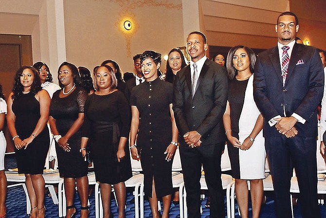 Medical school graduates, proud families and friends attend the induction and awards ceremony at Baha Mar as celebratory tunes are provided by the Royal Bahamas Defence Force Band. (BIS Photos/Kristaan Ingraham)