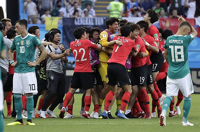 South Korea's players celebrate a goal during the group F match between South Korea and Germany, at the 2018 soccer World Cup in the Kazan Arena in Kazan, Russia, Wednesday. (AP Photo/Lee Jin-man)

