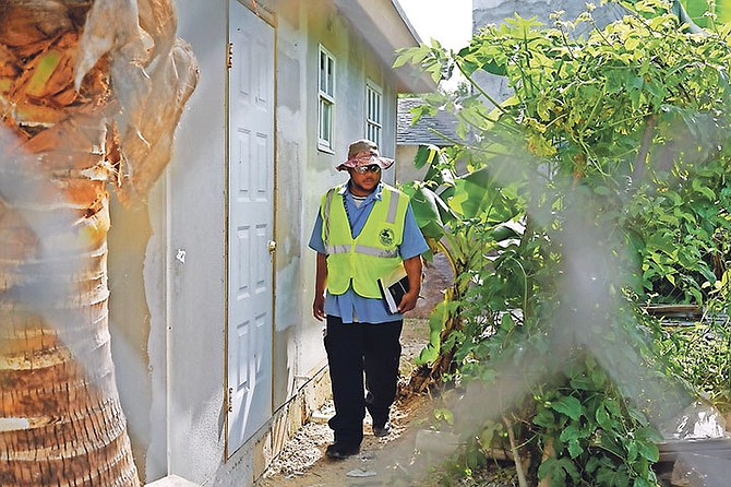 Shanty town notices being handed out recently. Photo: Terrel W. Carey/Tribune Staff