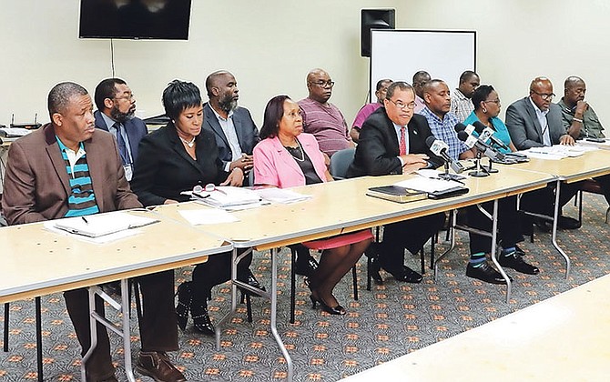 Heads of the Shanty Town Action Task Force led by Senator Dion Foulkes held a press conference yesterday. Photo: Derek Smith/BIS