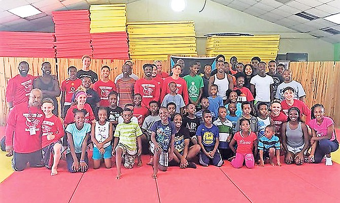 Instructors and students at the wrestling clinic.