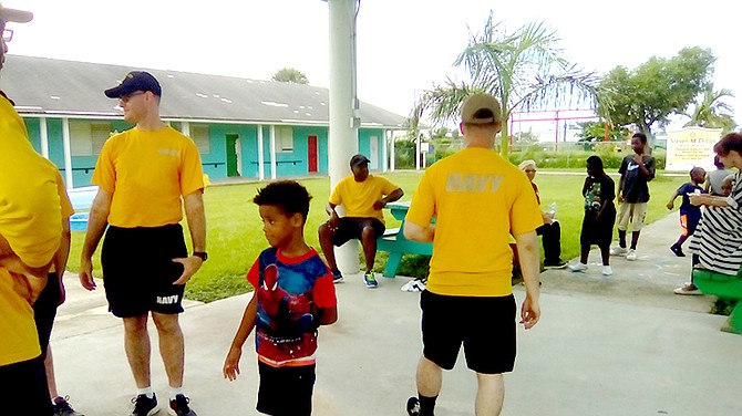 Crew members from the USS Hué City at Beacon School Summer Camp.