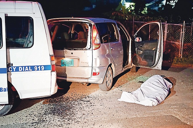 The body of Dario ‘Geico’ Tinker at the scene on Friday night.	Photo: Terrel W Carey/Tribune staff