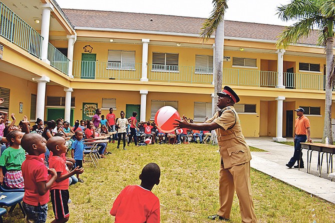 ACP Samuel Butler visited over 100 campers at the Royal Bahamas Police Force’s annual summer camp at St George’s High School on Friday. 