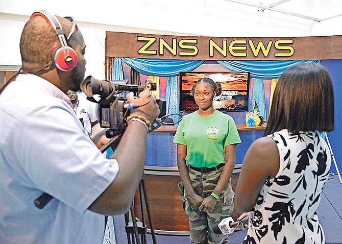 A young Ranger cadet showcasing her talent during a tour at the Bahamas Broadcasting Corporation’s Northern Service.