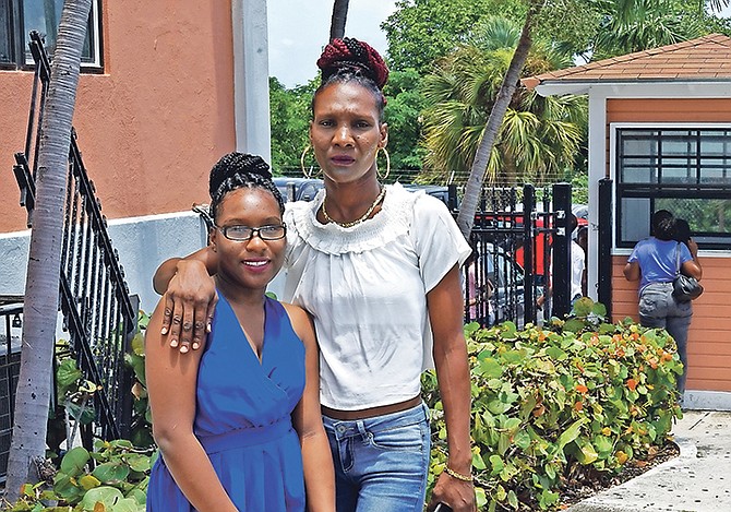 Taranique Thurston, aged 15, is still waiting for paperwork to allow her to travel to the United States for treatment of a life-threatening brain cyst. Taranique, pictured with her mother, Ginette Caty, was hopeful, however, saying she hoped to meet Prime Minister Dr Hubert Minnis so she could make her appeal in person. 

Photo: Terrel W Carey/Tribune Staff