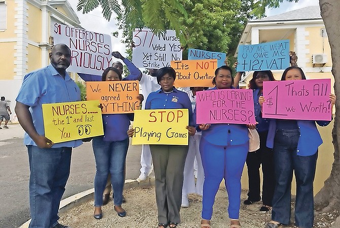 Members of the Bahamas Nurses Union protest outside Princess Margaret Hospital. Photo: Morgan Adderley/Tribune Staff

 