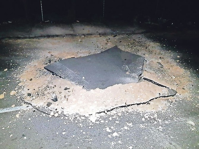 The area above the high voltage distribution line near the Blue Hill power station last night. While damage was minimal due to safety mechanisms, a small area of asphalt experienced damage from recoil.
