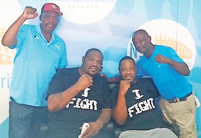 Vincent Strachan and Ray Minus Jr flank former world heavyweight champion Riddick Bowe and I Fight Promotions' CEO Chris Joy.