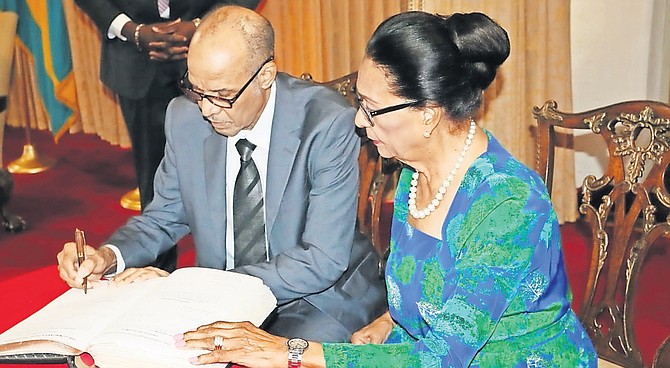 Chief Justice Stephen Isaacs alongside Governor General Dame Marguerite Pindling at his formal appointment earlier this month.