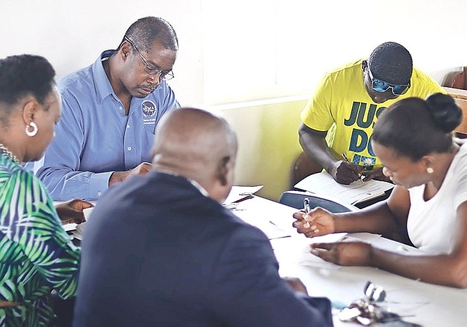 NEMA Director Captain Stephen Russell was recently in Ragged Island to issue cheques to assist those affected by Hurricane Irma last September. Photo: BIS