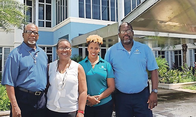 From left, Troy Smith, NIB chairman; Dr Nicola Virgil-Rolle, NIB director; Michela Barnett-Ellis, NIB board member; Michael Jones, president Inline Project Co Ltd.

 