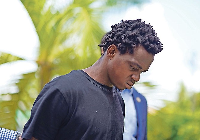 William Etienne, 26, outside Magistrate’s Court in connection with the recent murder of Alvin Strachan. Photo: Shawn Hanna/Tribune Staff