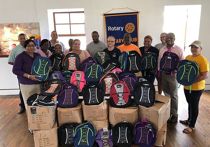 Bahamas Striping Group of Companies led by president Atario Mitchell presented president of the Rotary Club of Eleuthera, Sandra Ingraham and her team with 620 school bags for distribution at four of the island’s primary school and one high school. 
