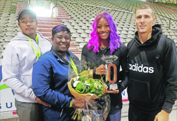 SHAUNAE Miller-Uibo with her parents, Shaun and May Miller, and husband Maicel Uibo at the King Baudouin stadium in Brussels on Friday after she won the 200 metres in the Diamond League Memorial Van Damme athletics event.
Photo by Brent Stubbs