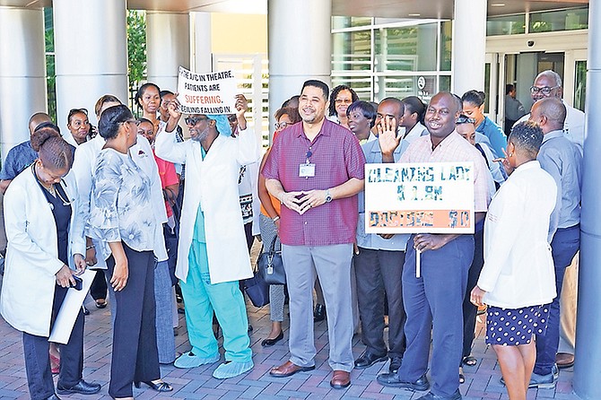 Practitioners protesting outside the Princess Margaret Hospital on Thursday over benefits and what they described as “ill-treatment”.

Photo: Terrel W Carey Sr/Tribune staff