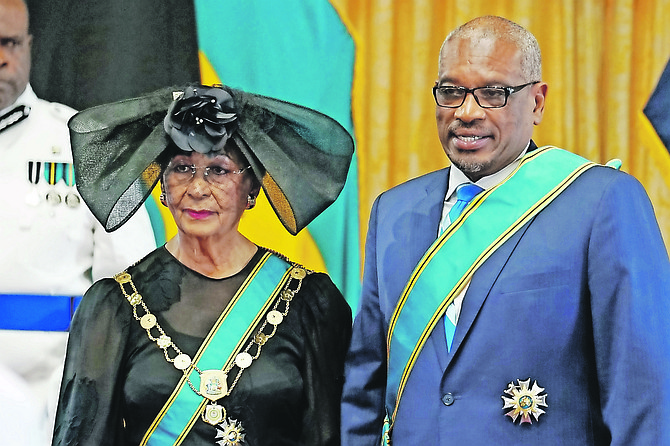 Prime Minister Dr Hubert Minnis was among those receiving awards at the first official National Honours investiture.
