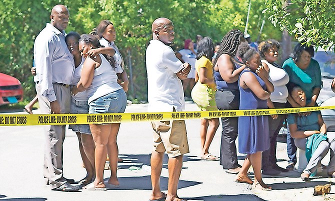 The scene of a double shooting off Taylor Street in Nassau Village on Friday which left one man dead and a woman injured. Photo: Shawn Hanna/Tribune Staff

