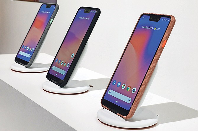 New Google Pixel 3 smartphones are displayed in New York. Google introduced two new smartphones in its relentless push to increase the usage of its digital services and promote its Android software that already powers most of the mobile devices in the world. Photo: Richard Drew/AP