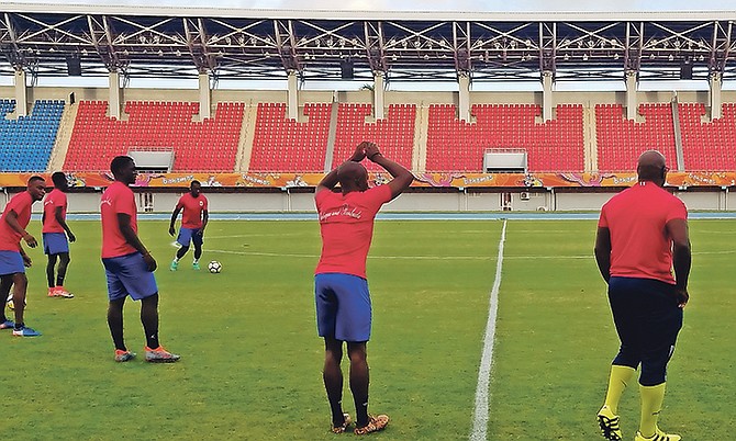 Antigua and Barbuda players work out at the national stadium.