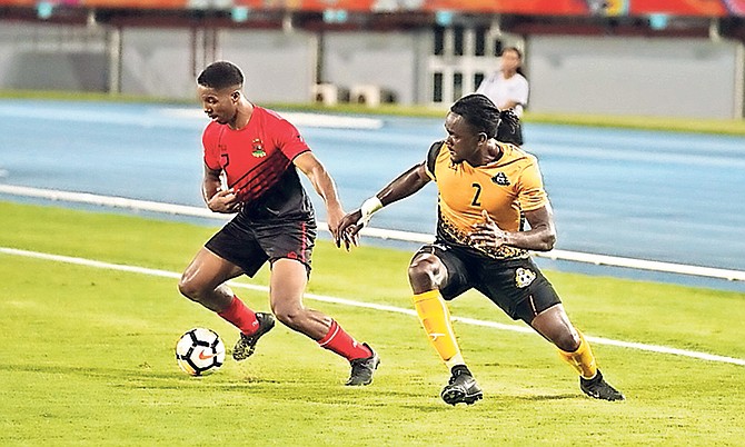 The Bahamas and Antigua and Barbuda in action at the Thomas A Robinson National Stadium. Photo: Terrel W Carey/Tribune staff

