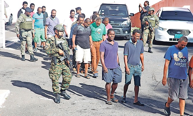 Some of the Dominican poachers arrested by the Royal Bahamas Defence Force. 