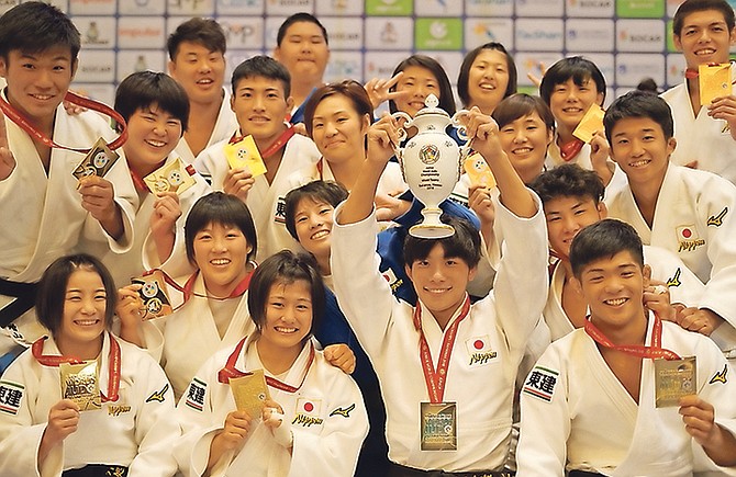 WE ARE THE CHAMPIONS: Japan emerged as the top team in the standings on Sunday night. Photo: Terrel W Carey/Tribune staff