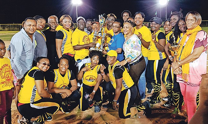 The Sunshine Auto Wildcats celebrate winning their title.