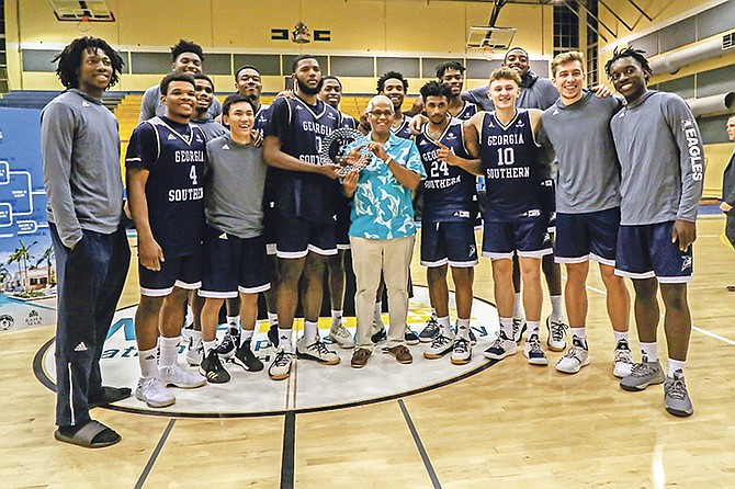 DIONISIO D’Aguilar with Georgia Southern Eagles team members.